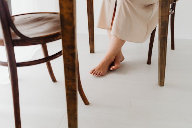 female-feet-under-table